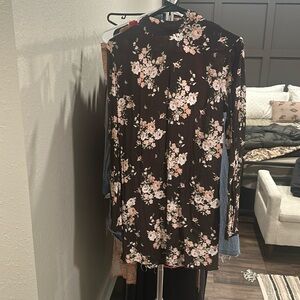 Women’s long sleeves dress with open back. Ties at the top.